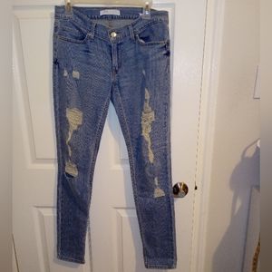 Women's Levis 524 Skinny 28 x 32 distressed jeans